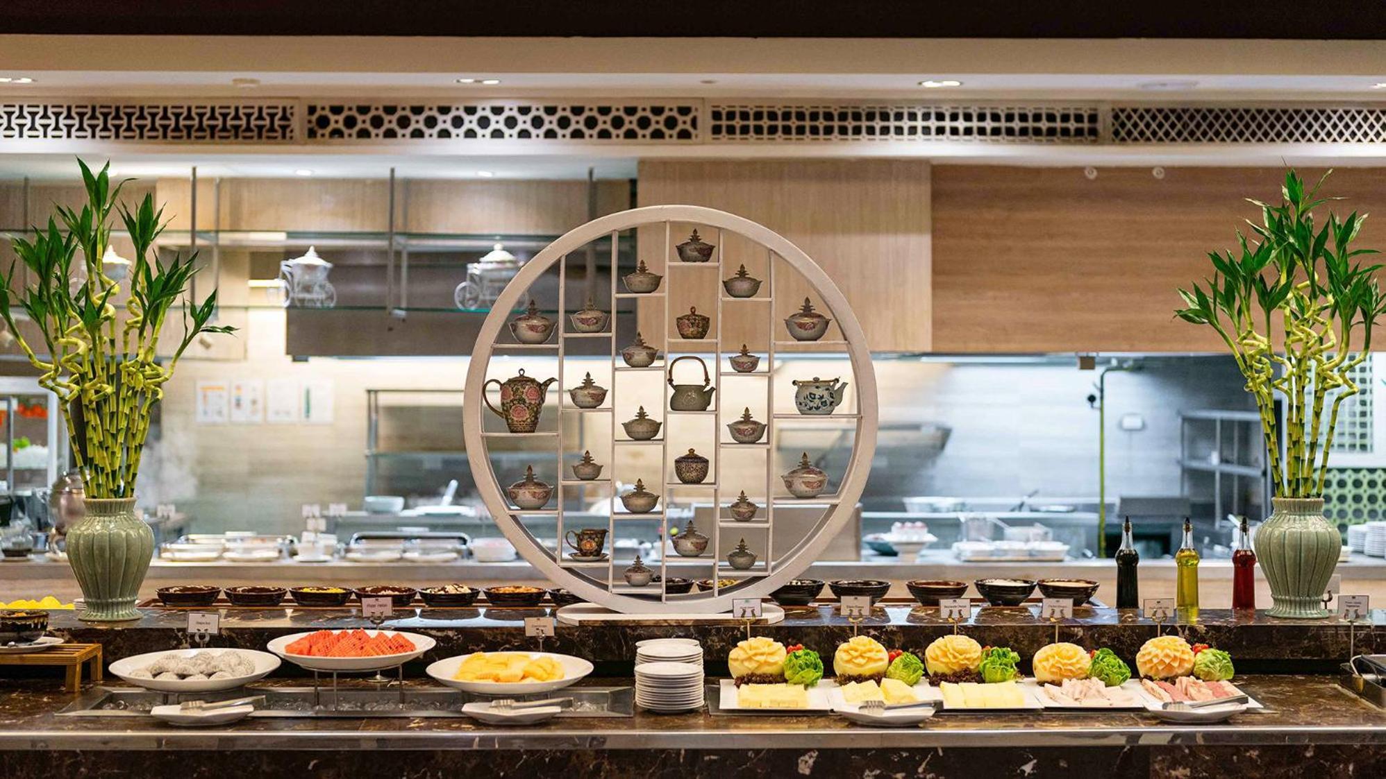 Phuket Graceland Resort And Spa Patong Exterior photo The buffet at the restaurant